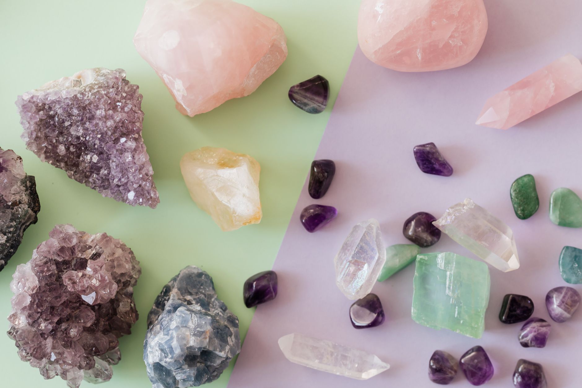 pink rose quartz crystal mass embedded in gray granite rock